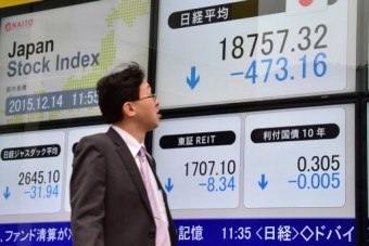 Tokyo stocks close lower on higher yen